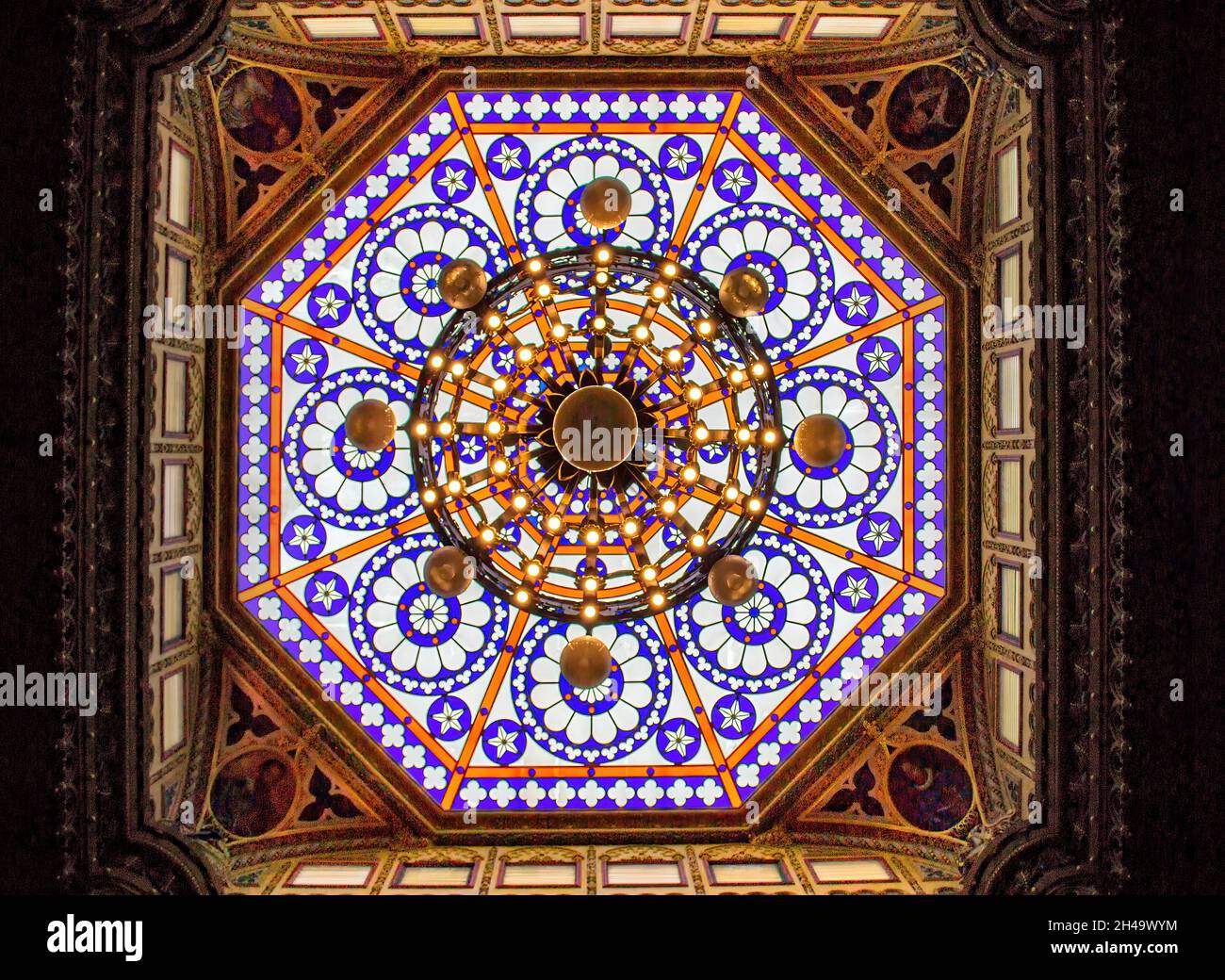 Stained glass skylight in the ceiling of the Real Gabinete Portuguez de Leitura in Rio de Janeiro, Brazil. The old building is a public library and al Stock Photo