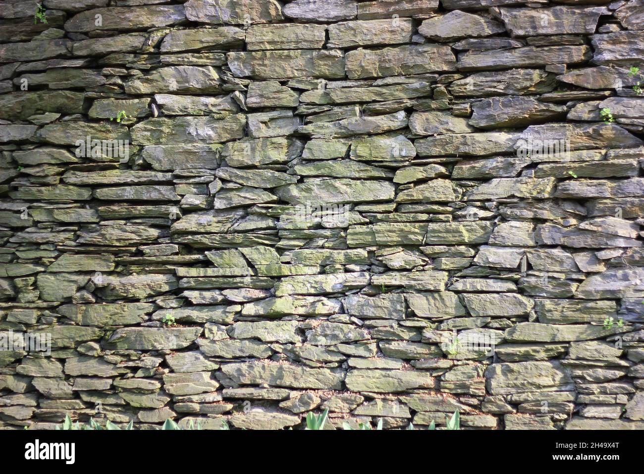 backgrounds full frame Wall Architecture stone wall Textured pattern built structure solid wall - building feature no people day brick rough stone mat Stock Photo