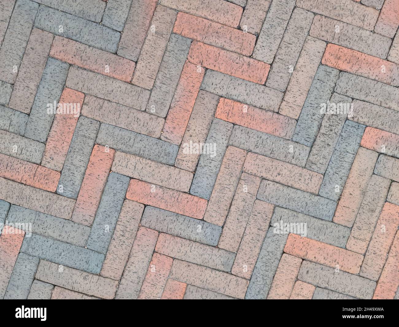 Brown paving slabs laid out in herringbone shape background Stock Photo Alamy