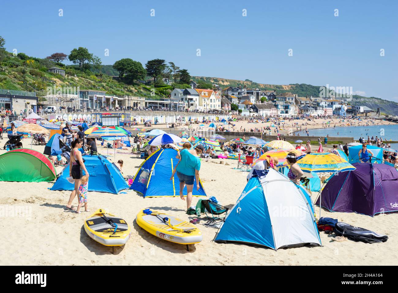 Lyme Regis Family on the beach with pop up beach tents on Sandy beach at Lyme Regis Dorset England UK GB Europe Stock Photo Alamy