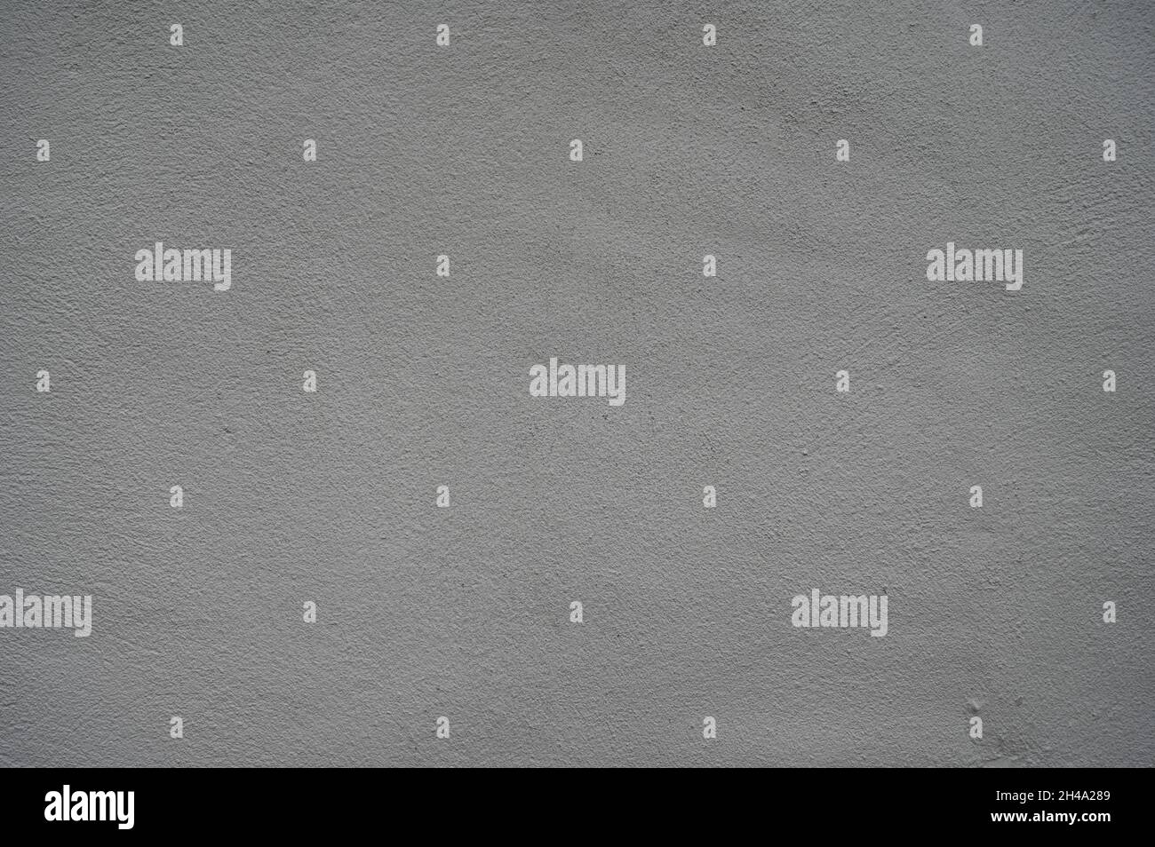 Textured painted outside off white wall background. Stock Photo