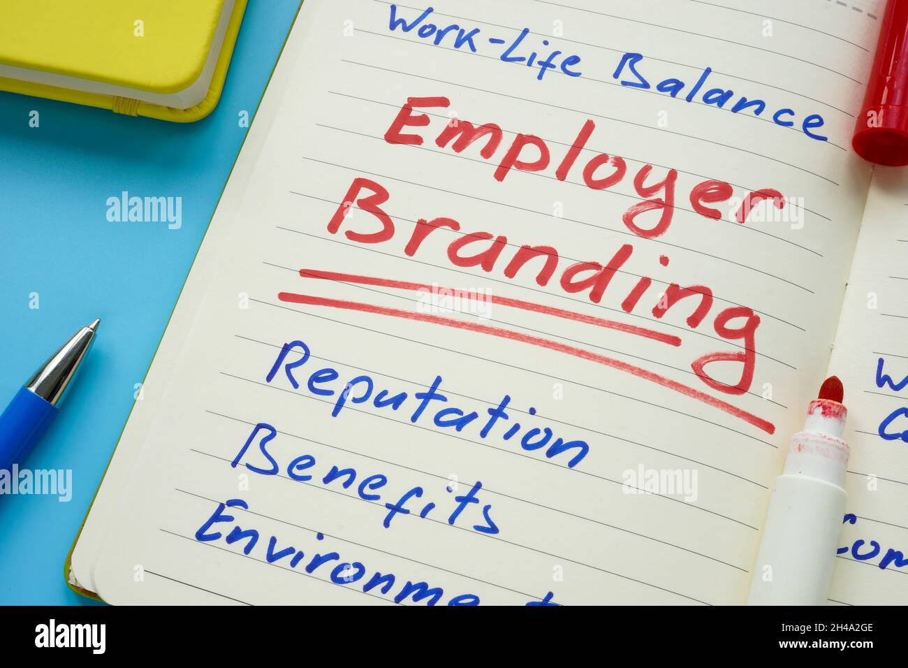 Open notebook and Employer branding inscription on the page. Stock Photo