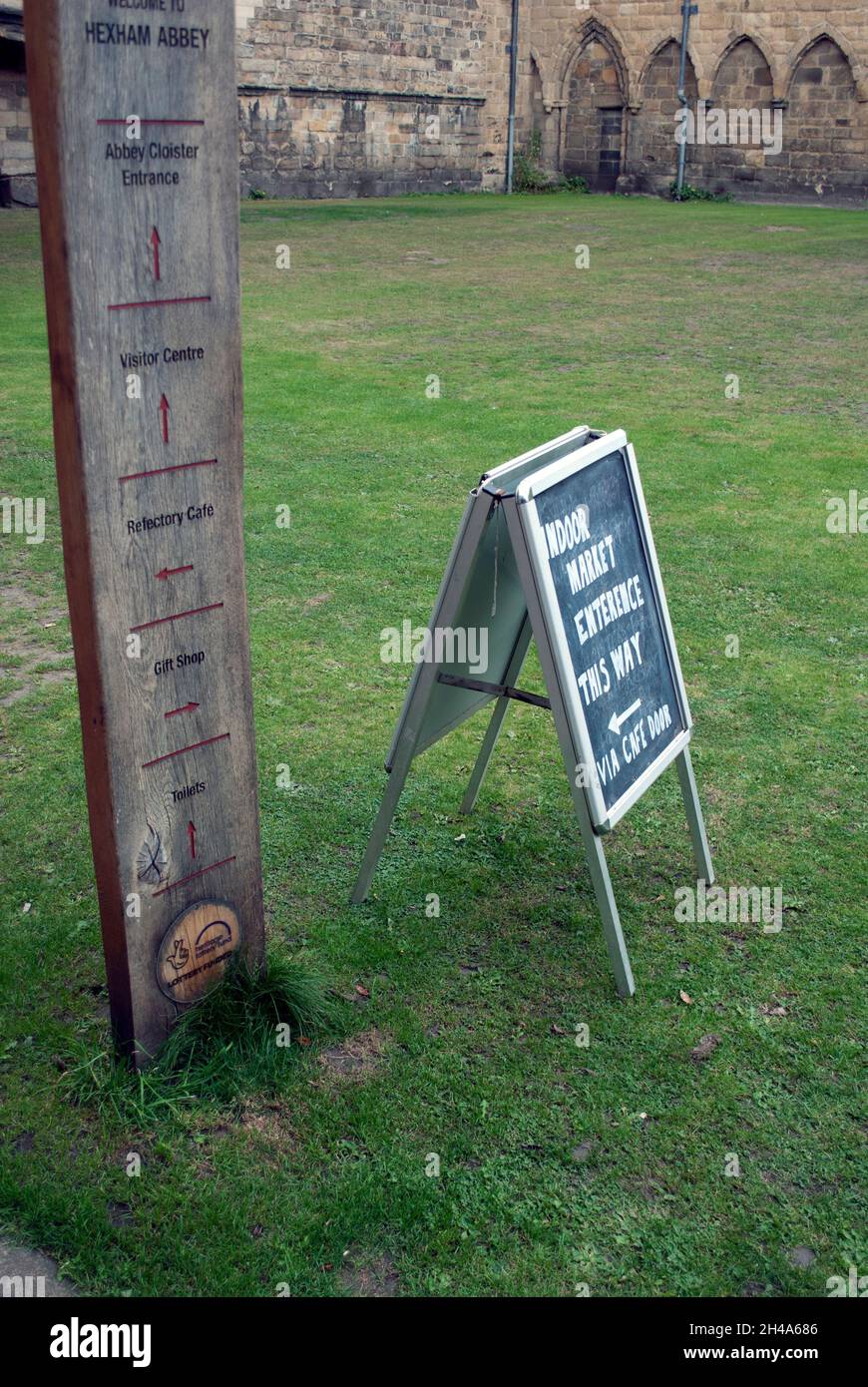 Signs for Hexham Abbey and indoor market, Hexham, Northumberland, England, UK Stock Photo Alamy