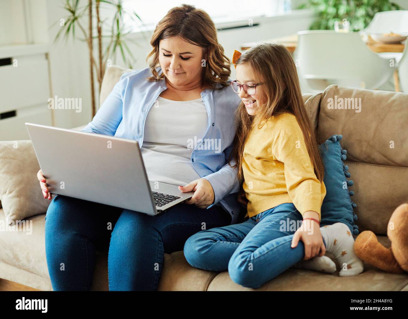 laptop computer education mother children daughter girl familiy