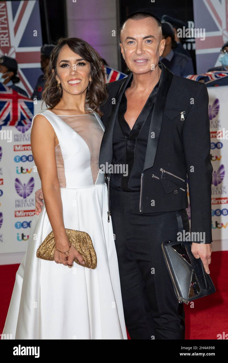 London, UK. 30th Oct, 2021. Janette Manrara and Julian MacDonald attend the Pride of Britain awards in partnership with TSB at the Grosvenor House Hotel, Park Street in London. Credit: SOPA Images Limited/Alamy Live News Stock Photo