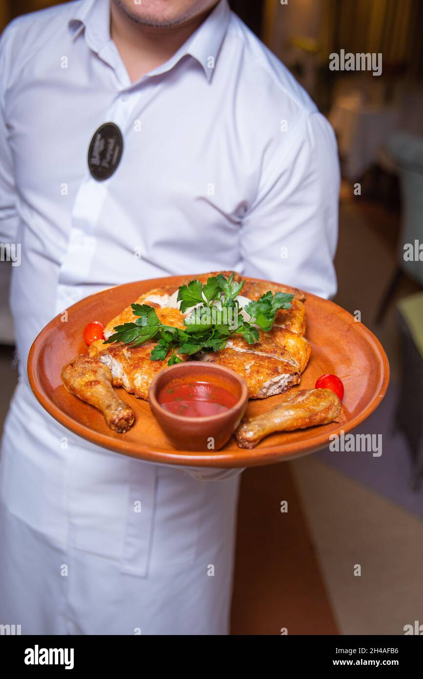 Waiter holding fast food tray hi-res stock photography and images - Alamy