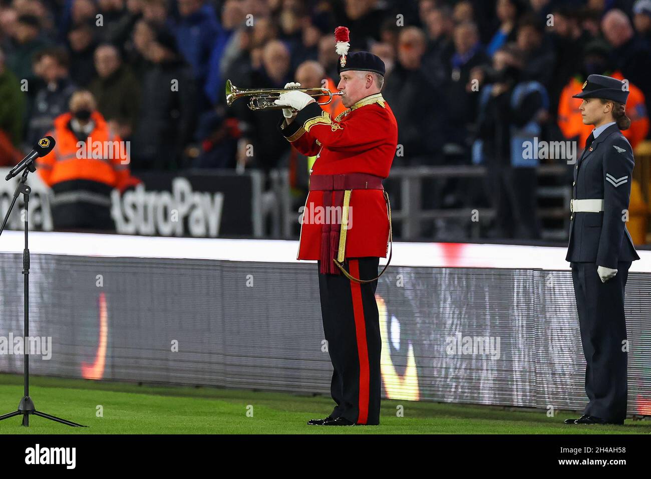 Bugler last call for armesty before tonights game Stock Photo