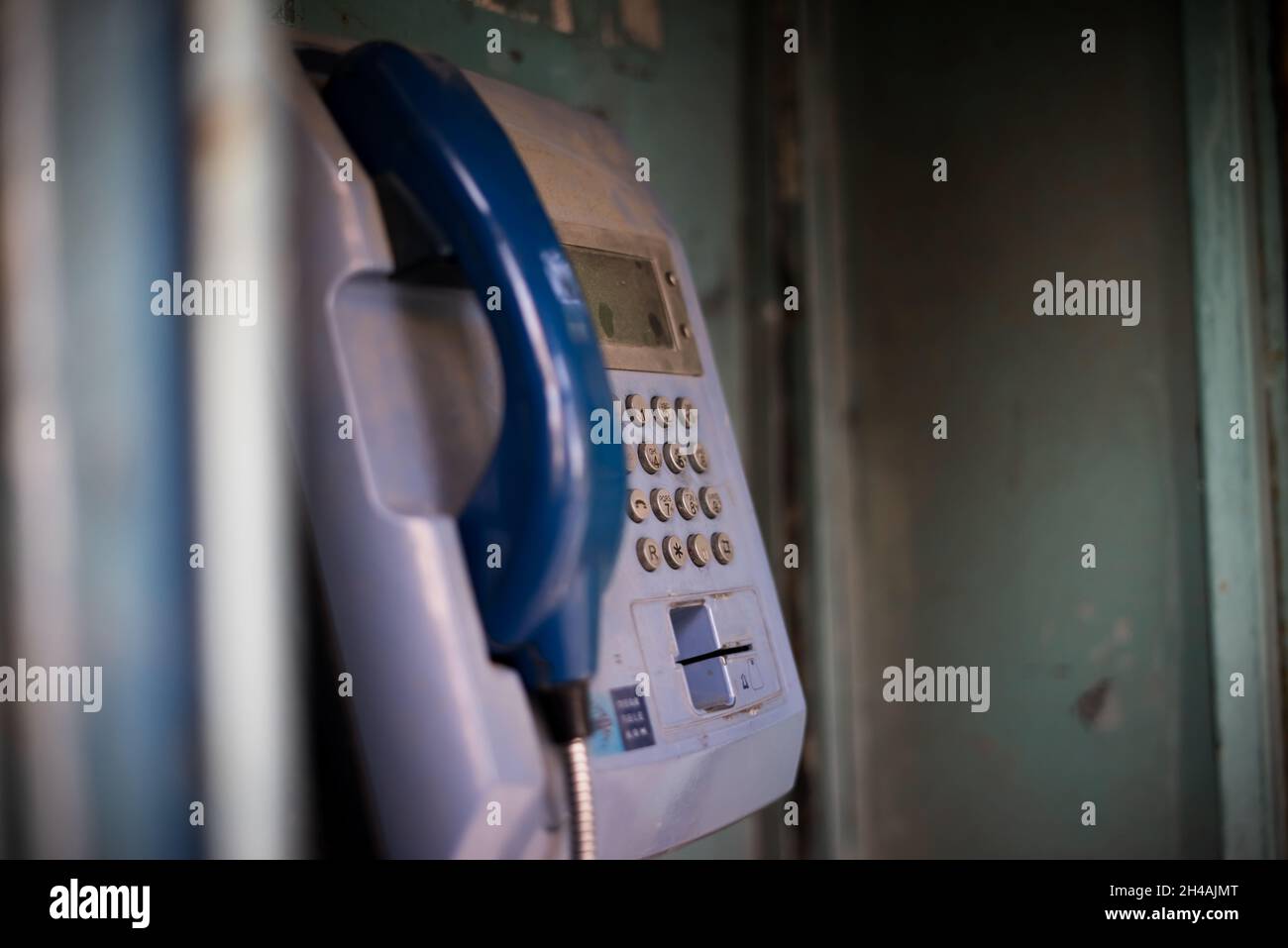 Old blue telephone booth with numbers Stock Photo Alamy
