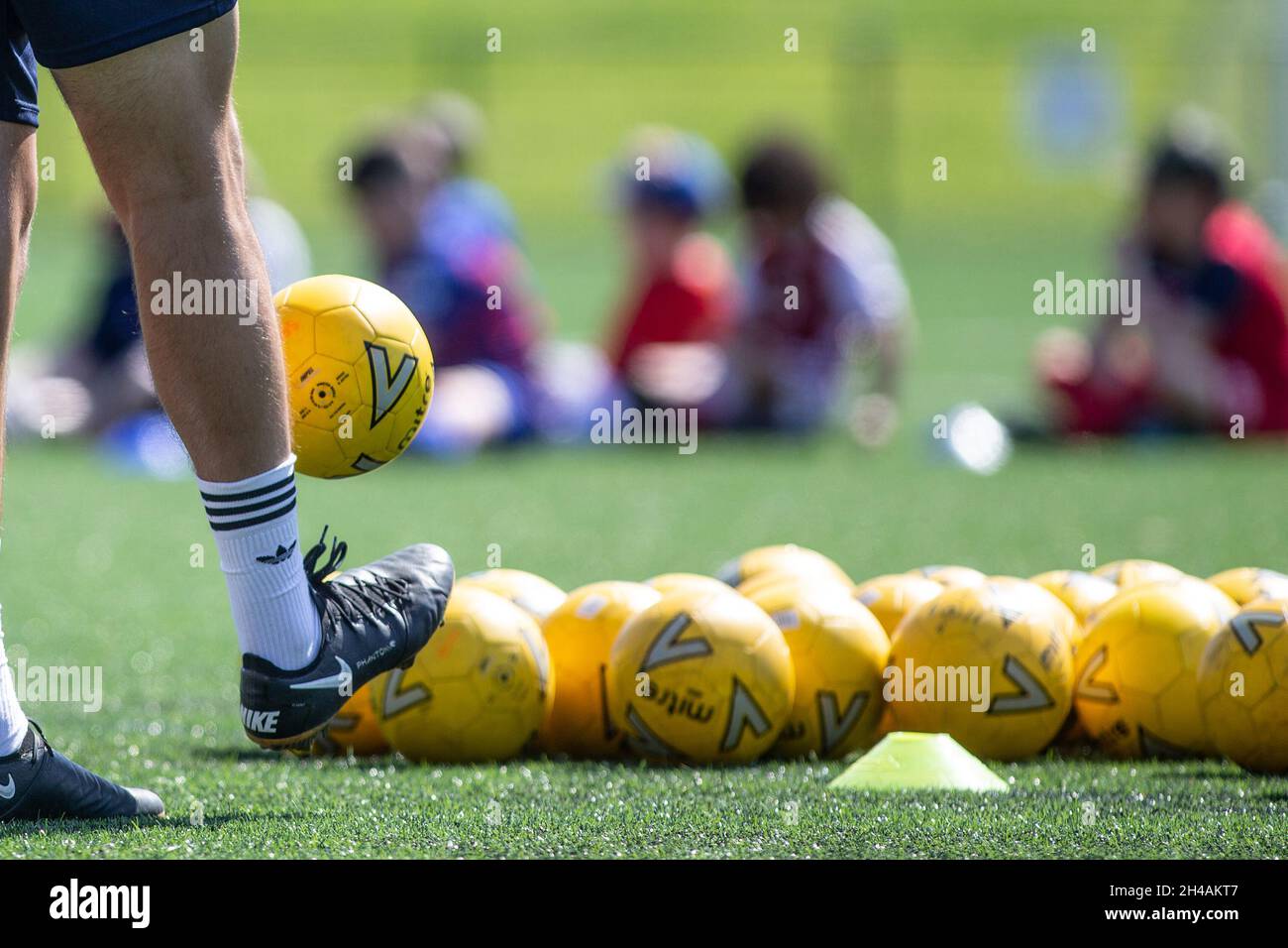 unidentifiable children at grassroots football / soccer camp in UK Stock Photo