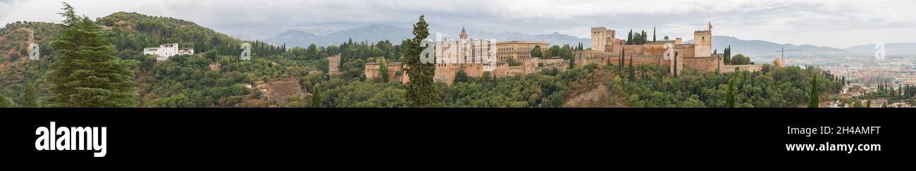 Alhambra Granada Spain - 09 14 2021: Full panoramic exterior at the Alhambra citadel, view Viewpoint San Nicolás, a palace and fortress complex locate Stock Photo