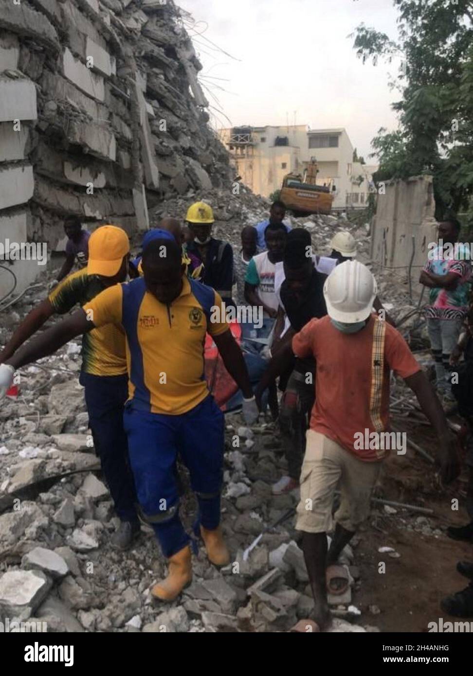 Lagos, Nigeria. 1st Nov, 2021. Rescuers work at the site of a building