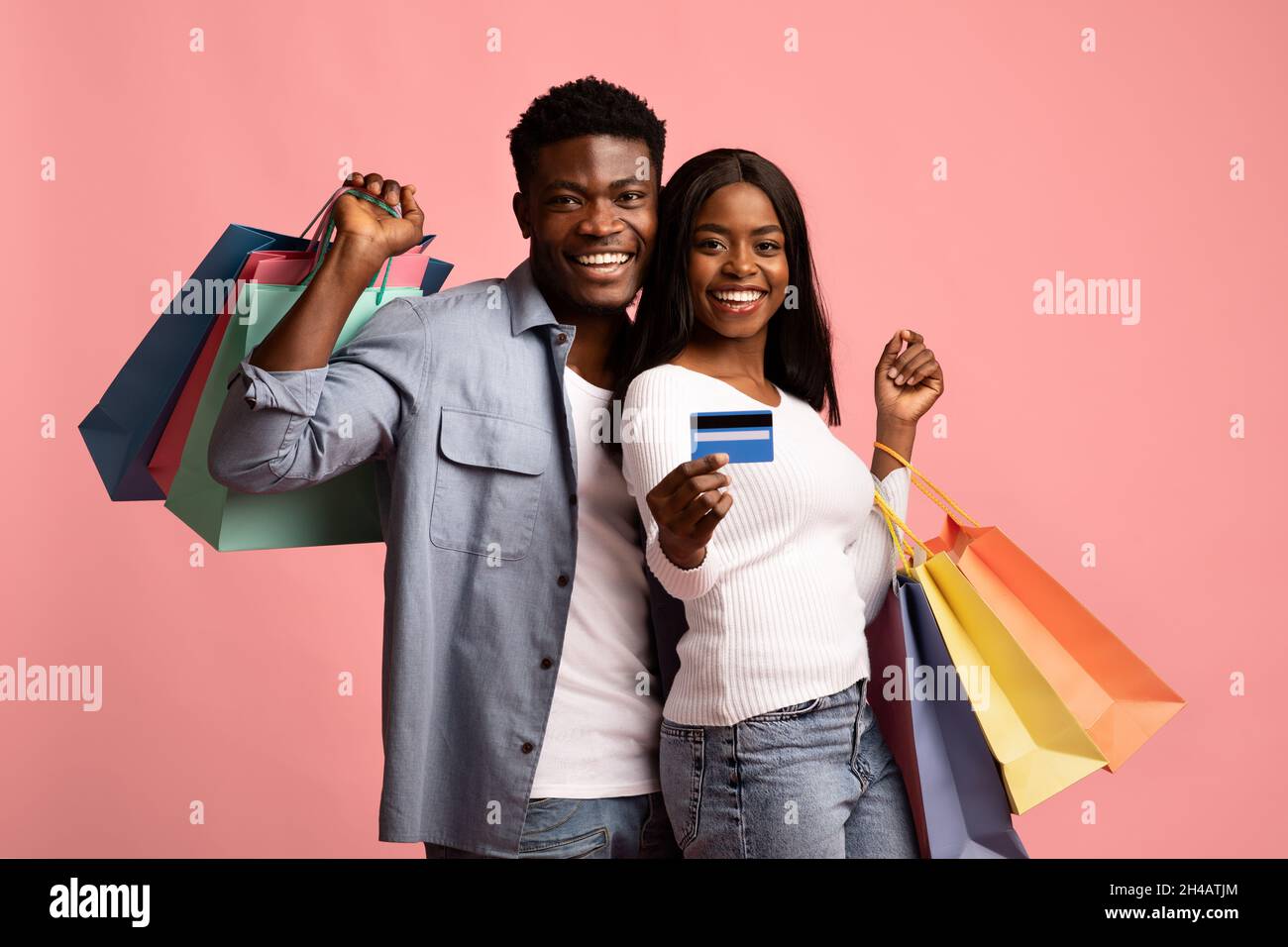 Cheerful african american millennial family husband and wife in casual ...