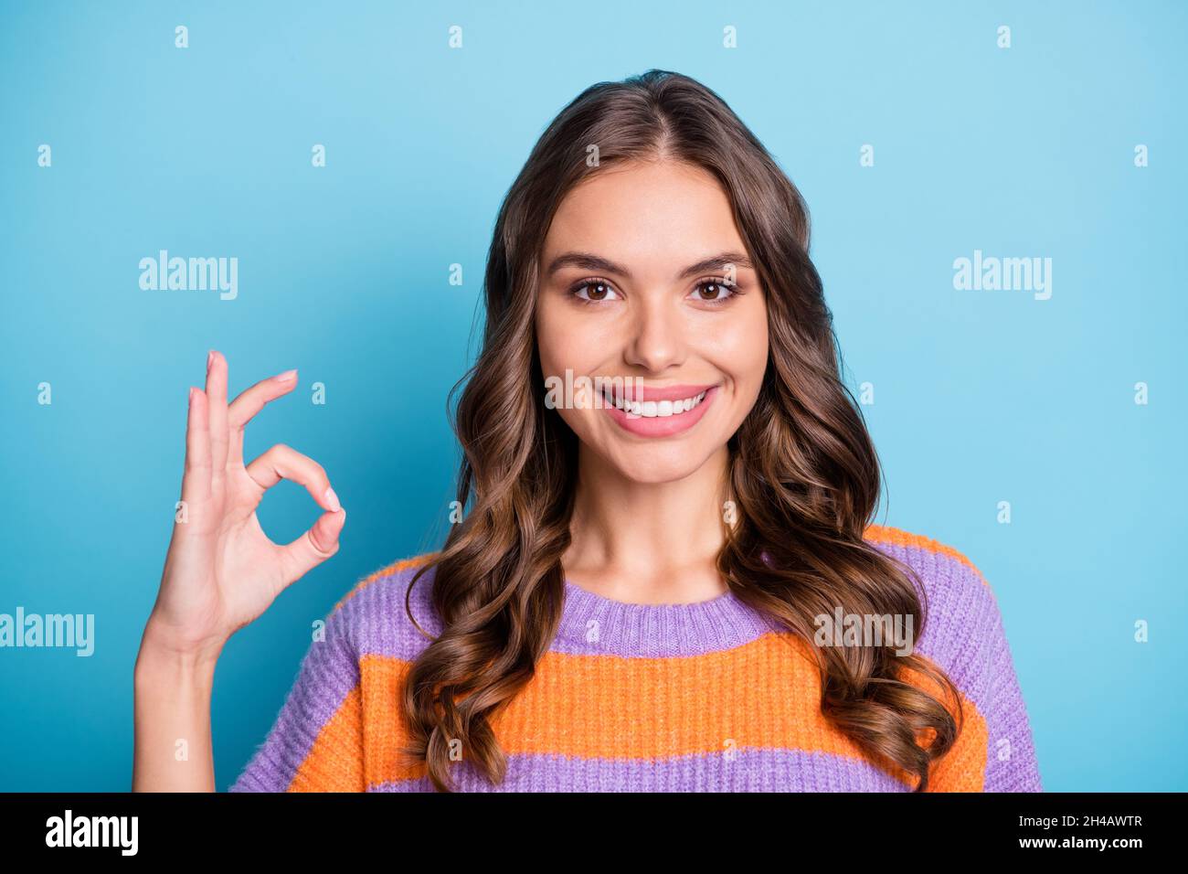 Photo of gorgeous beautiful young woman make okay sign approve nice ...