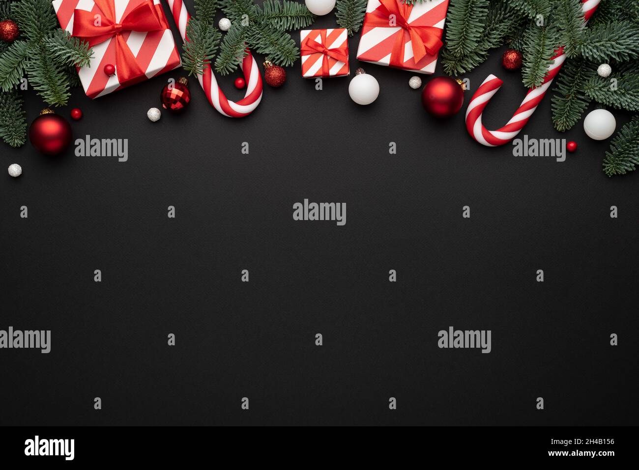 Black background with christmas decorations and and copy space for text Stock Photo