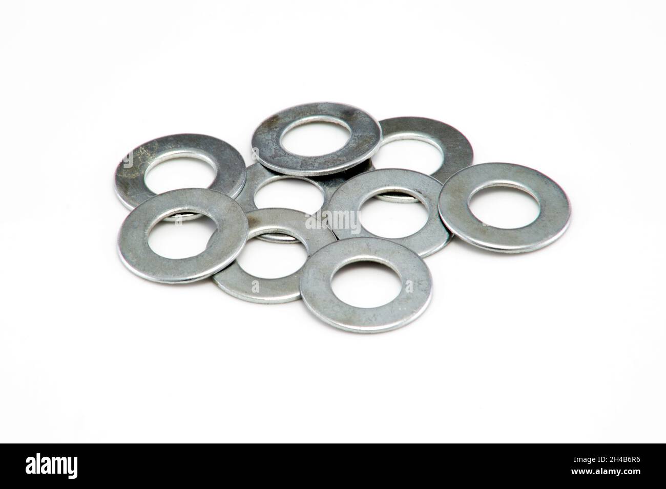 Pile of washers of different sizes background image Stock Photo