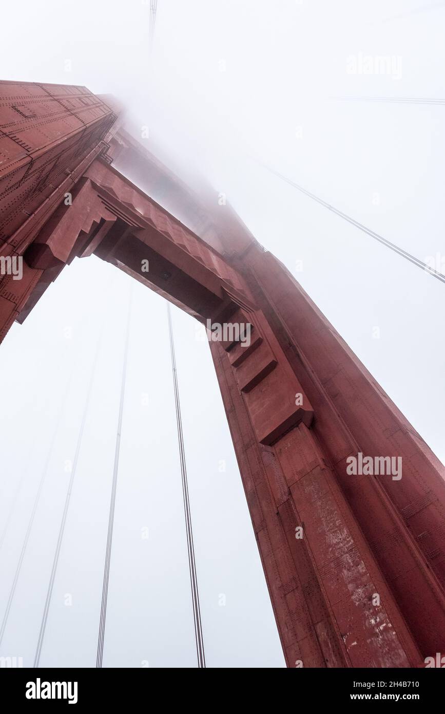 Beneath a giant pillar of the Golden Gate Bridge, San Francisco, USA Stock Photo