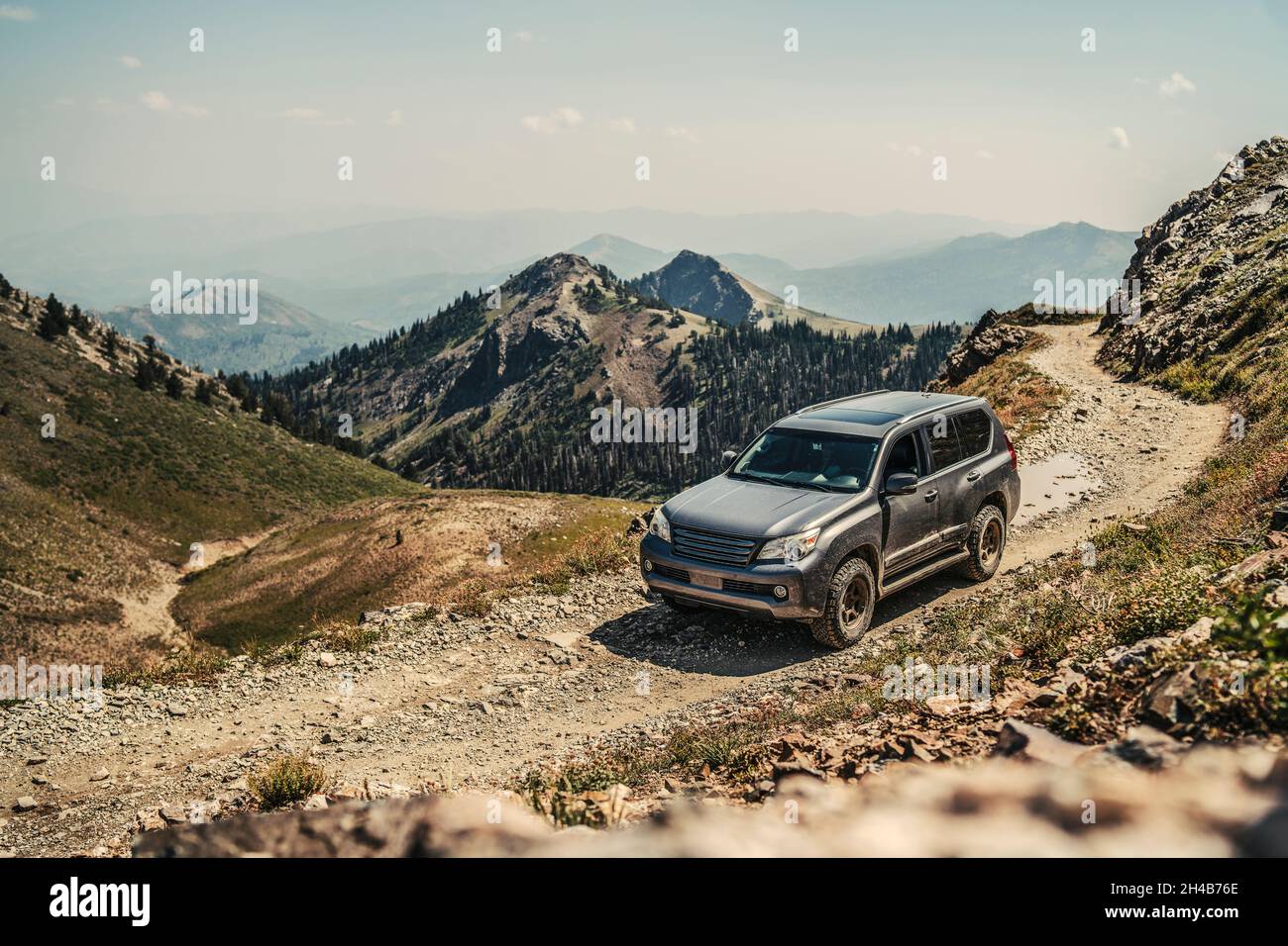 Offroad vehicle on trail in Wasatch Mountains Stock Photo Alamy