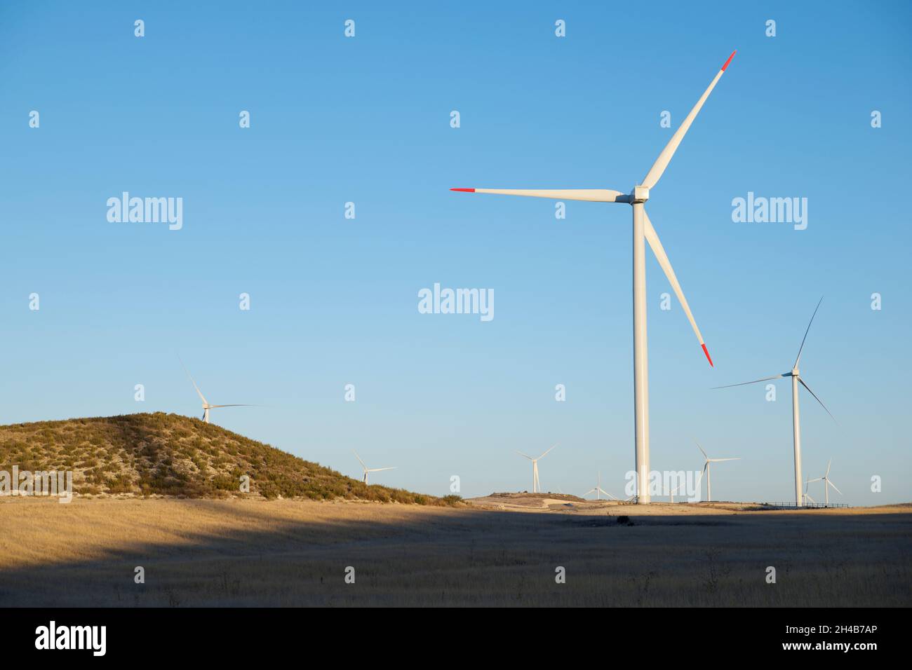 Windmills for energy production in Zaragoza province, Spain. Stock Photo