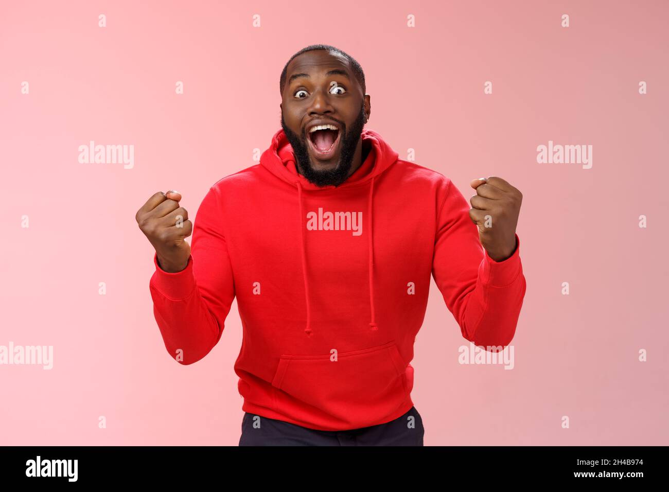 Very happy lucky black bearded guy winning lottery made winning bet