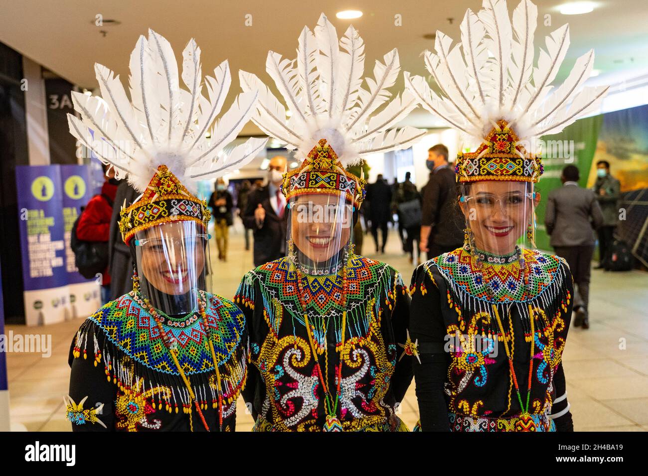 Glasgow, Scotland, UK. 1st November 2021. Images from Monday at the UN climate change conference in Glasgow. Pic; Three Indonesian females in traditional national costume with face shields at the COp26 venue.  Iain Masterton/Alamy Live News. Stock Photo
