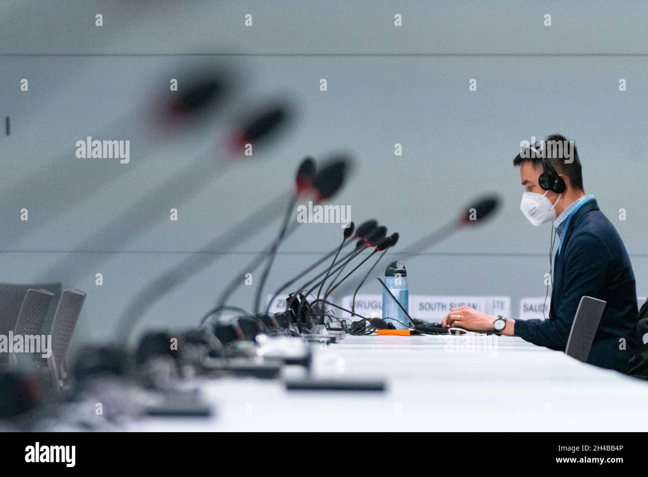 Glasgow, Scotland, UK. 1st November 2021. Images from Monday at the UN climate change conference in Glasgow. Pic;  Delegate to conference listens to Plenary Session speeches by Prime ministers of countries attending the conference Iain Masterton/Alamy Live News. Stock Photo