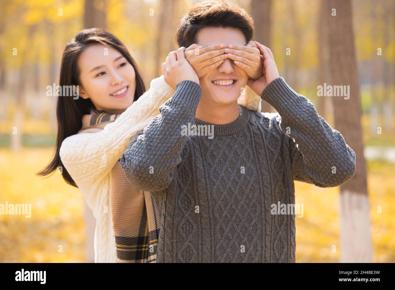 Happy young lovers in autumn Stock Photo
