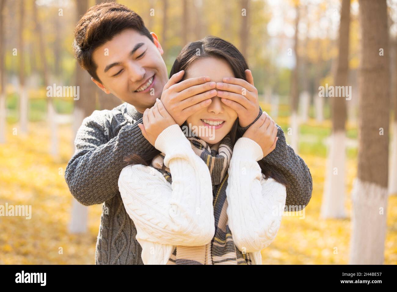 Happy young lovers in autumn Stock Photo