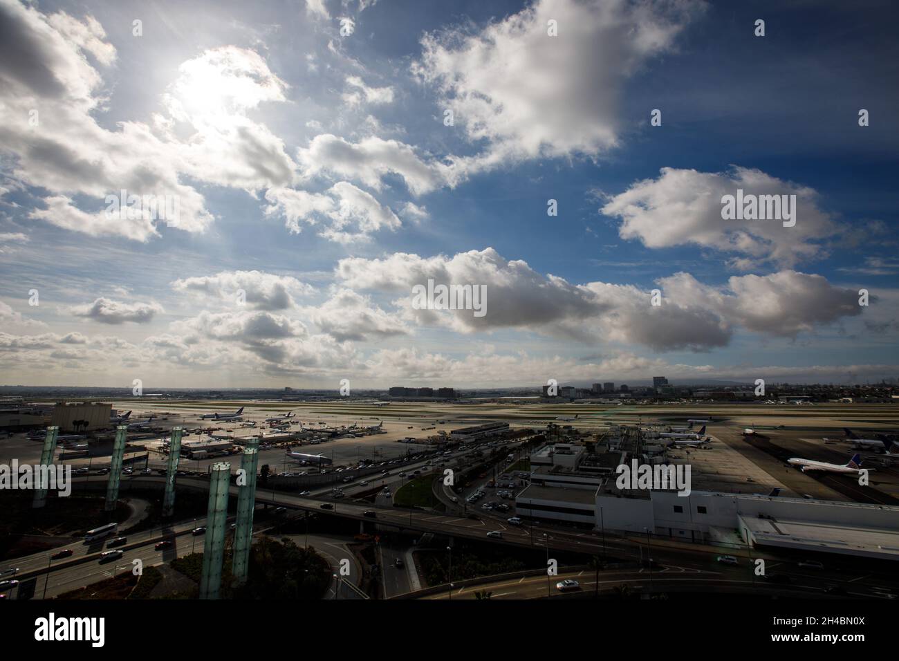 Los Angeles, California, USA. 28th Mar, 2019. The Los Angeles International Airport (LAX) central terminal area (CTA) and United Airlines Terminal 7/8 as seen from the roof of the Clifton A. Moore Administration Building, the former air traffic control tower building, on Thursday, March 28, 2019 in Los Angeles, Calif. © 2019 Patrick T. Fallon (Credit Image: © Patrick Fallon/ZUMA Press Wire) Stock Photo