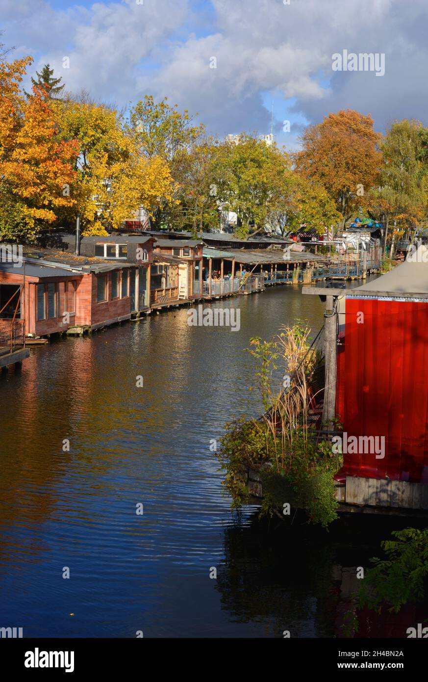 Berlin, Germany, beautiful view to the little wooden huts and restaurants at the Flutgraben canal Stock Photo