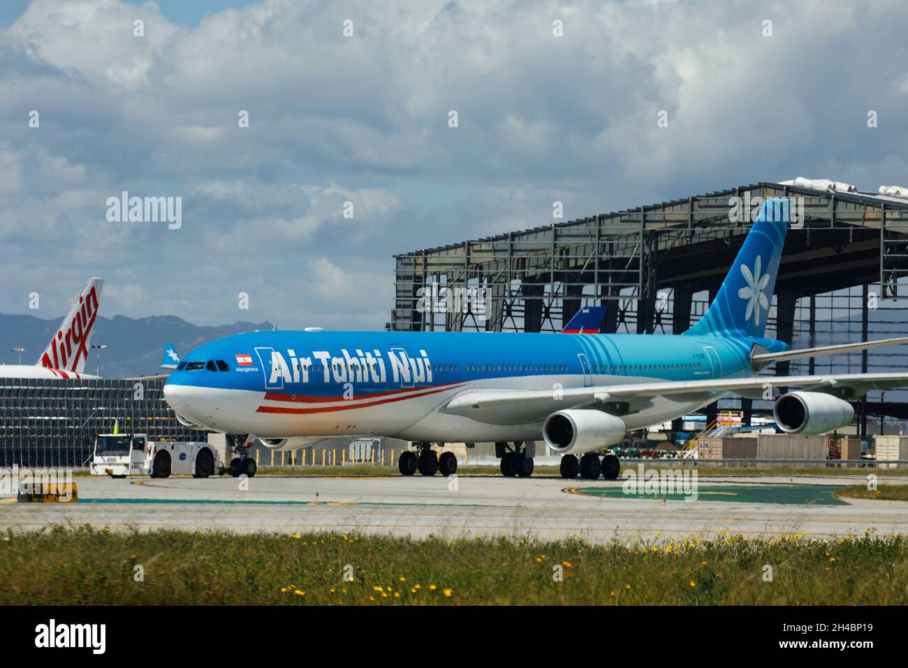 Los Angeles, California, USA. 28th Mar, 2019. An Air Tahiti Nui Airbus A340-300 (Registration F-OJGF) on the tarmac at Los Angeles International Airport (LAX) on Thursday, March 28, 2019 in Los Angeles, Calif. © 2019 Patrick T. Fallon (Credit Image: © Patrick Fallon/ZUMA Press Wire) Stock Photo