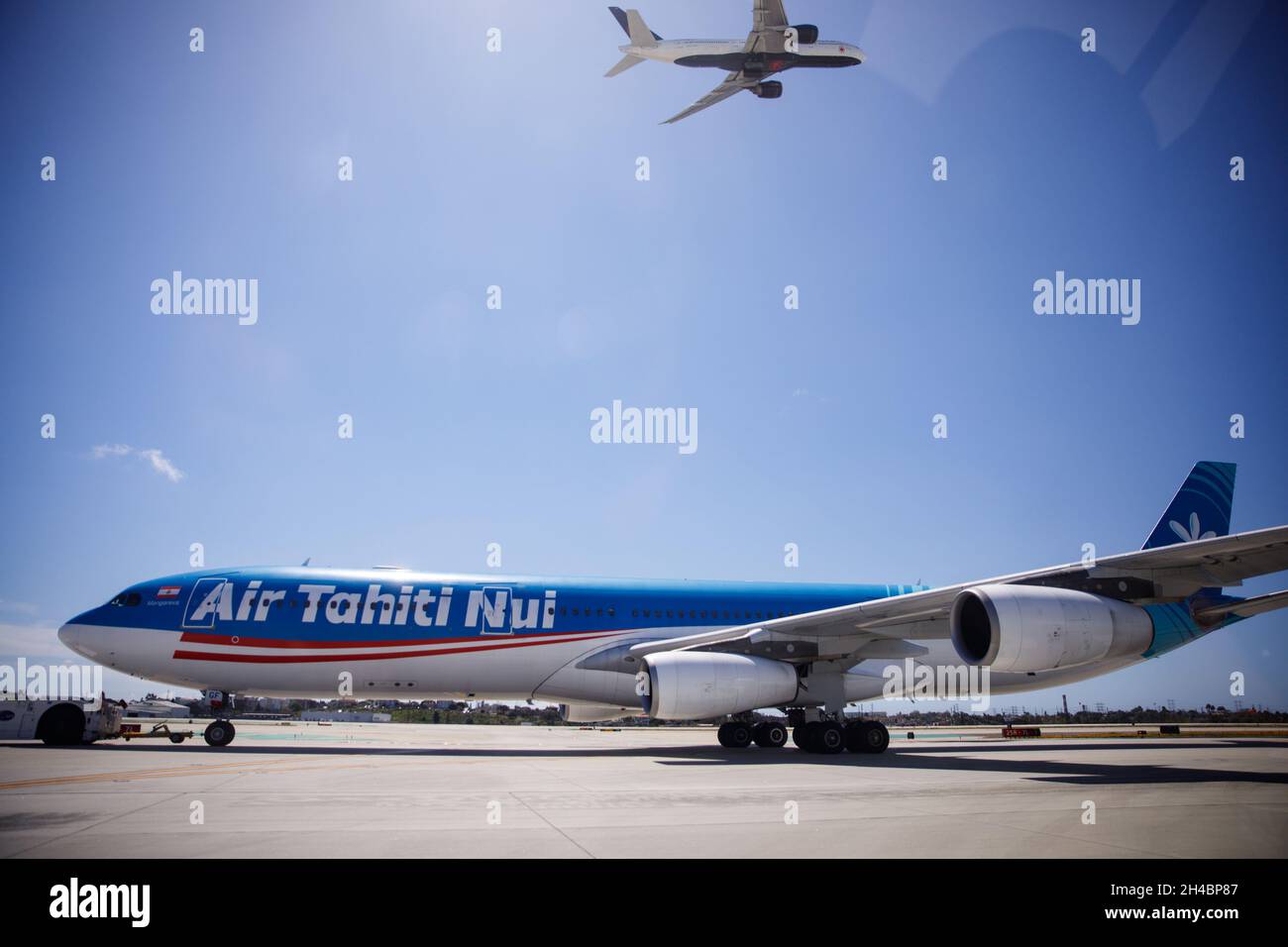 Los Angeles, California, USA. 28th Mar, 2019. An Air Tahiti Nui Airbus A340-300 (Registration F-OJGF) on the tarmac at Los Angeles International Airport (LAX) on Thursday, March 28, 2019 in Los Angeles, Calif. © 2019 Patrick T. Fallon (Credit Image: © Patrick Fallon/ZUMA Press Wire) Stock Photo