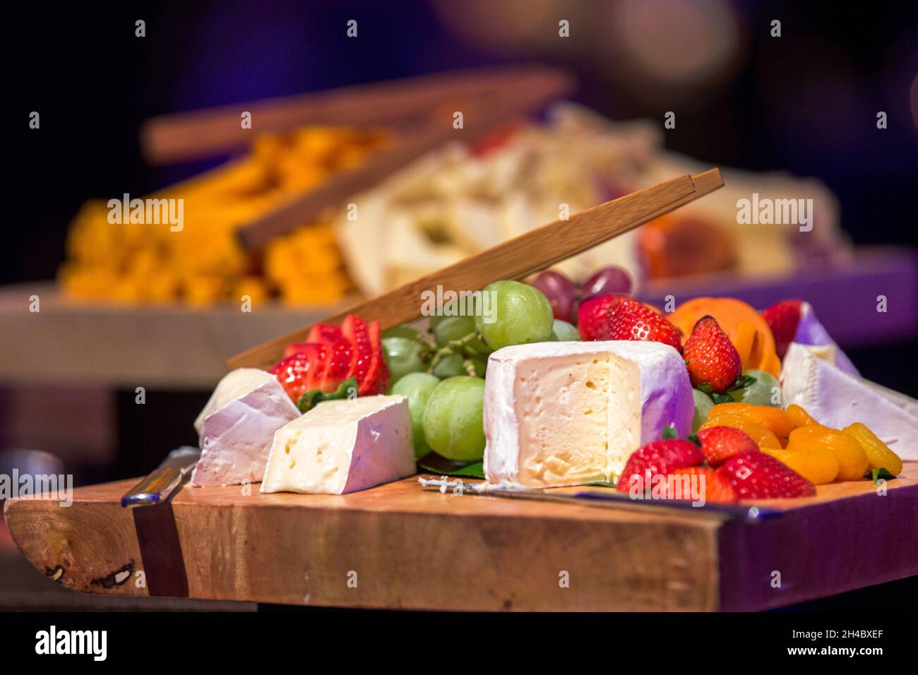 A cheese buffet is set up at an event Stock Photo Alamy