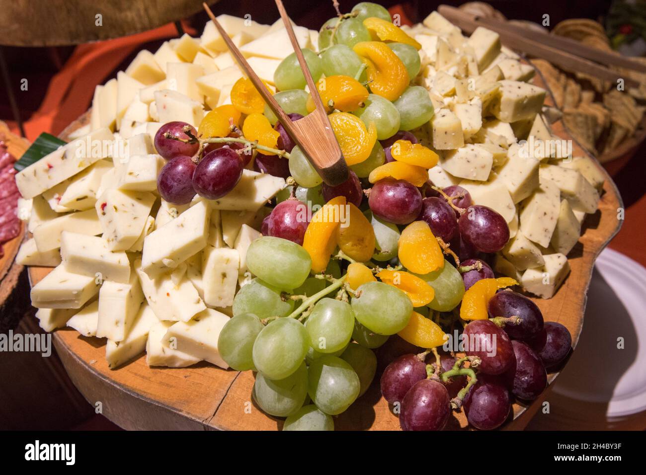 A cheese buffet is set up at an event Stock Photo Alamy