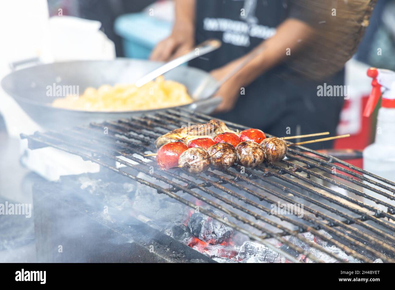 BBQ cook on the charcoal grill, Philippines Stock Photo Alamy