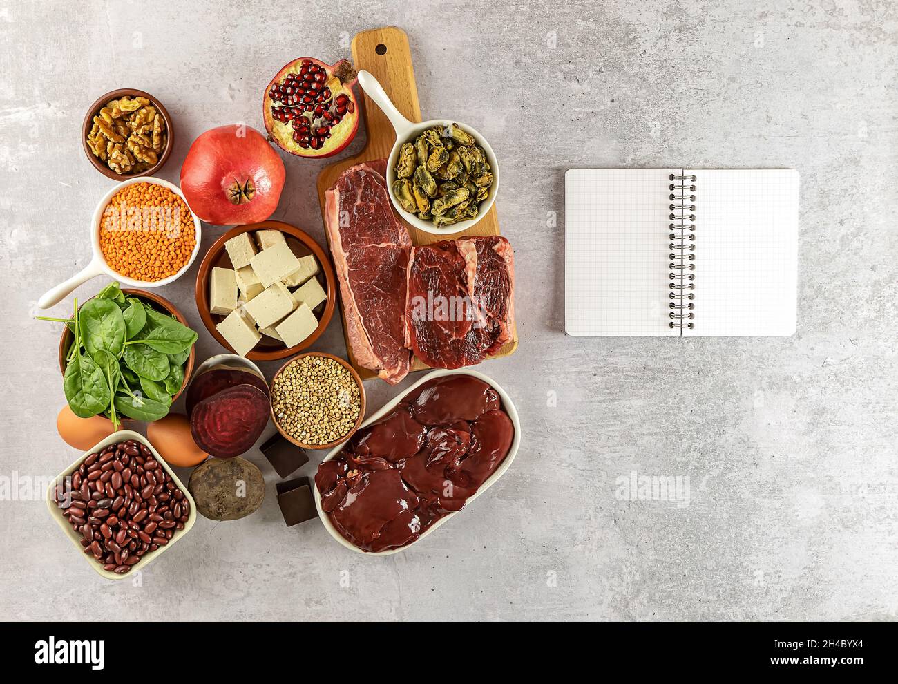 Foods high in Iron, including eggs, nuts, spinach, beans, tofu, liver