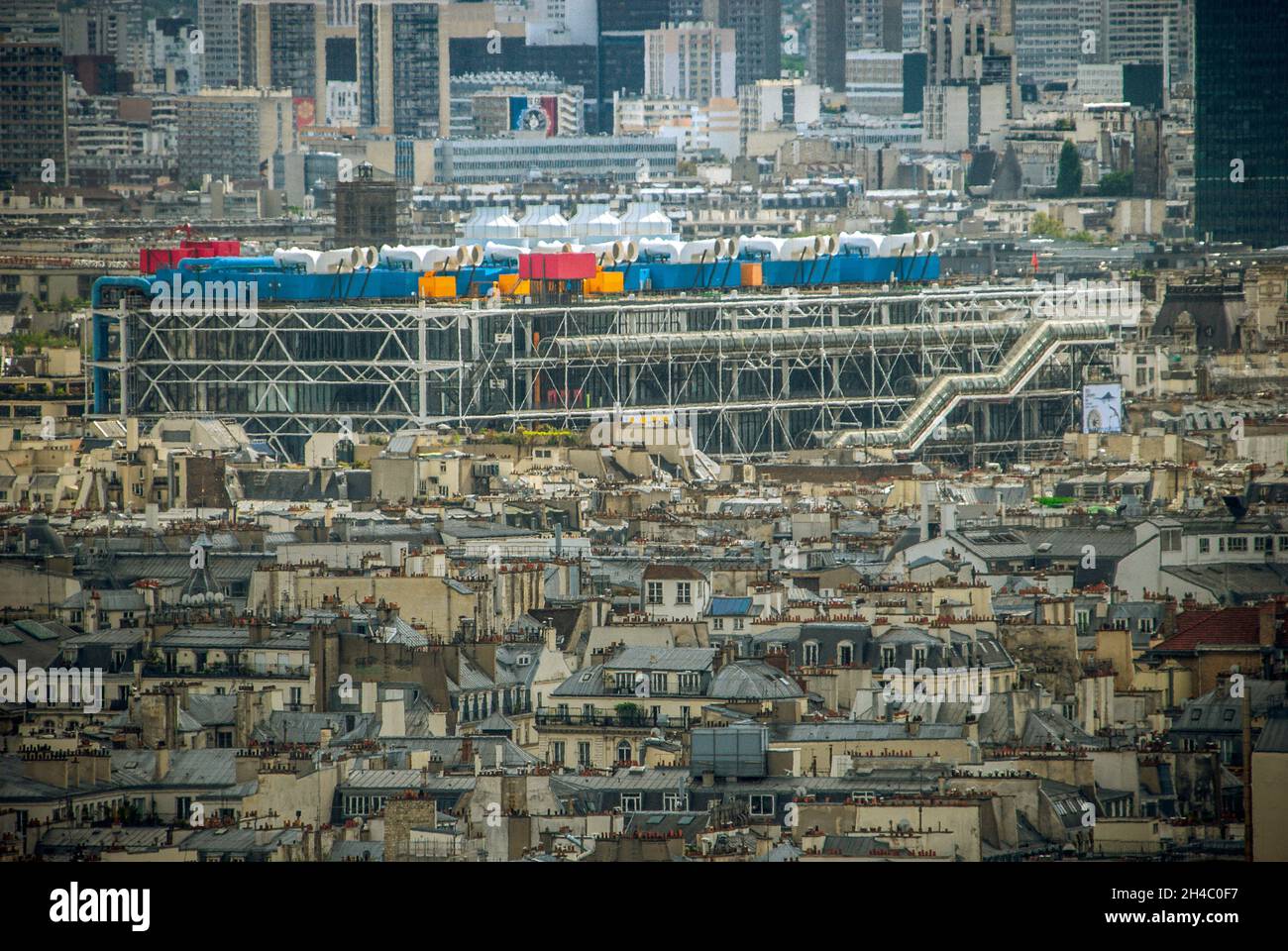 The Centre Pompidou seen over Parisian rooftops Stock Photo