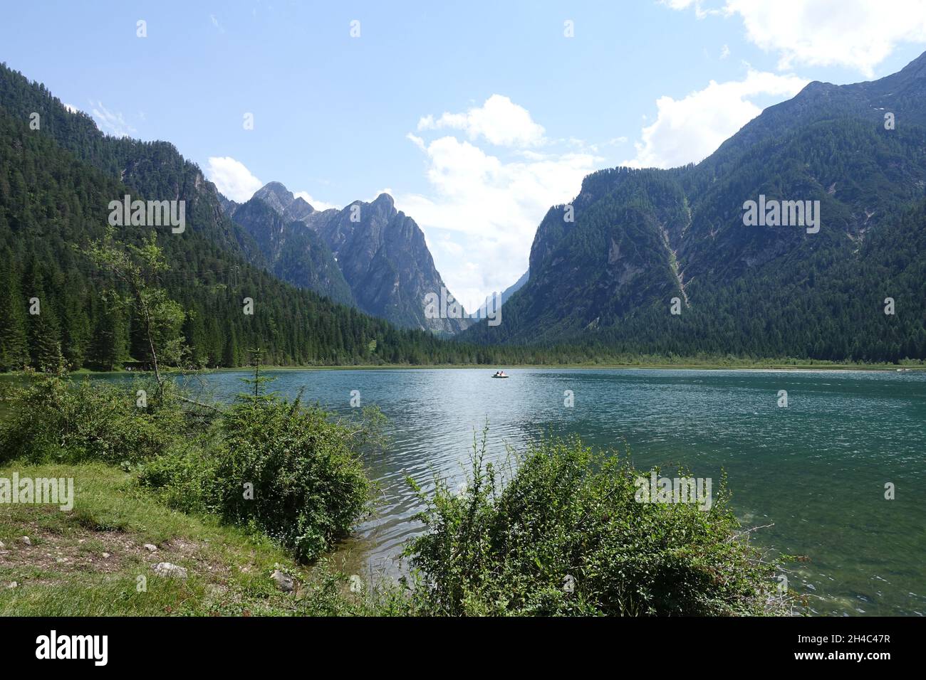 Lake in Italian alps on a hot summer day - hiking in mountains of the world Stock Photo