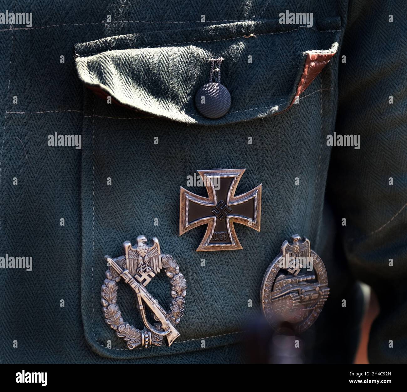 German second world war awards and badges on uniform pocket. Stock Photo