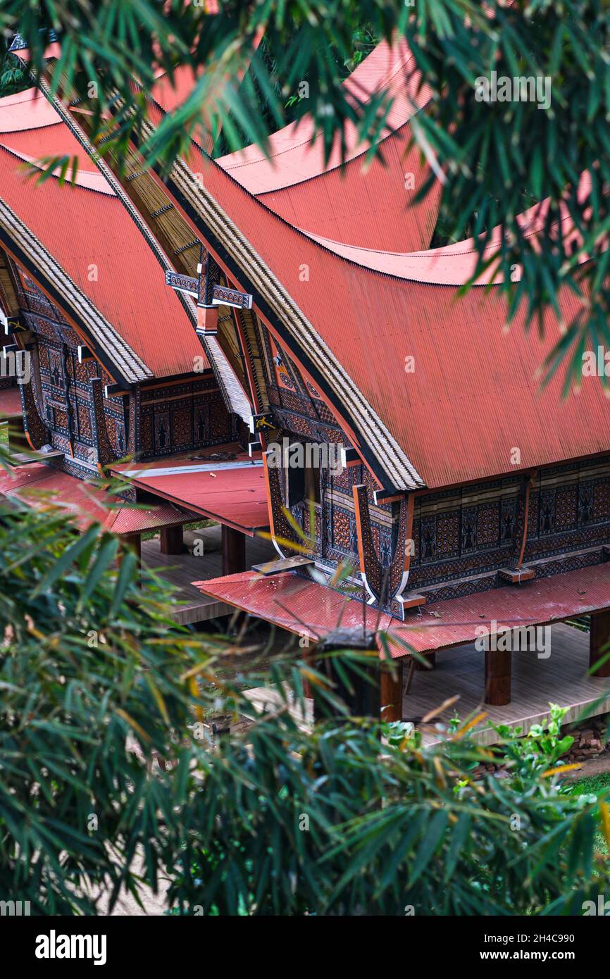 MAKALE, INDONESIA - Aug 31, 2021: A vertical shot of traditional houses of the Tana Toraja Regency in Indonesia Stock Photo