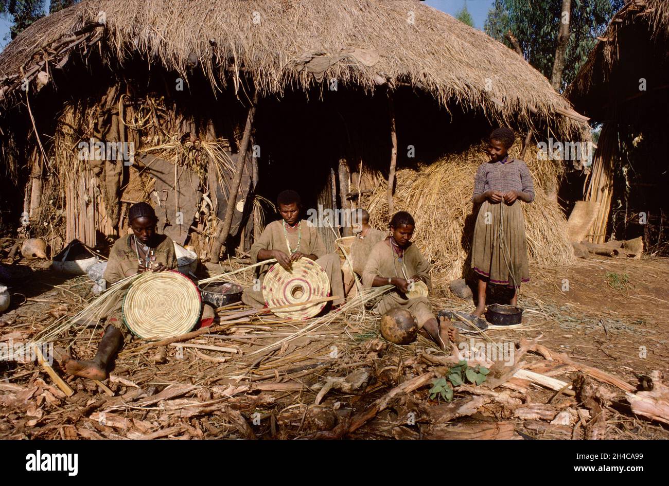 Africa, Ethiopia Bahir Dar, 1976. A group of women weaving baskets in a