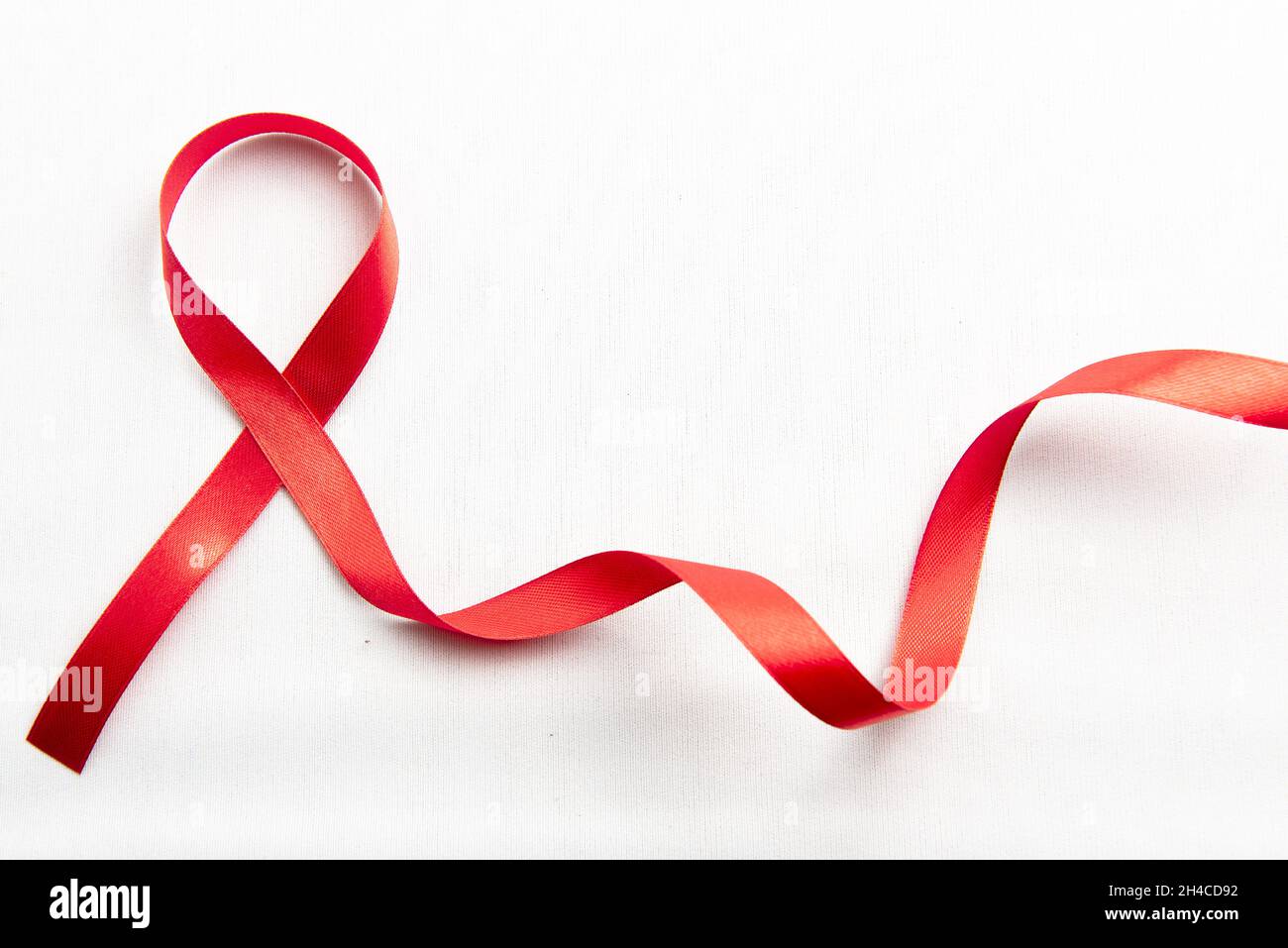 Red Support Ribbon isolated on white background. World aids day