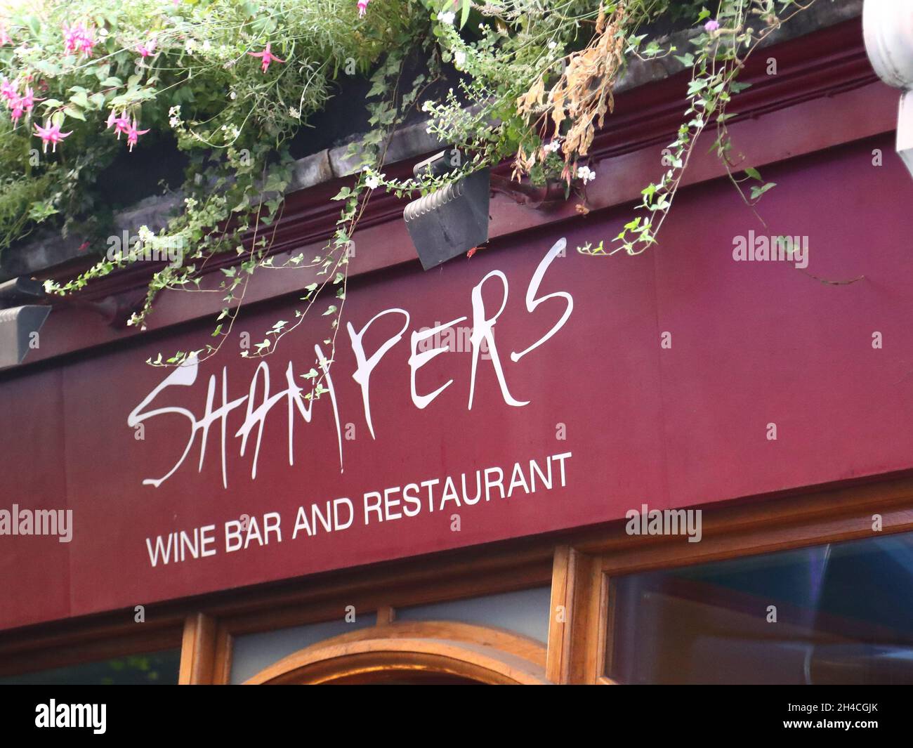 Sign above Shampers wine bar and restaurant in Soho, London, UK Stock Photo