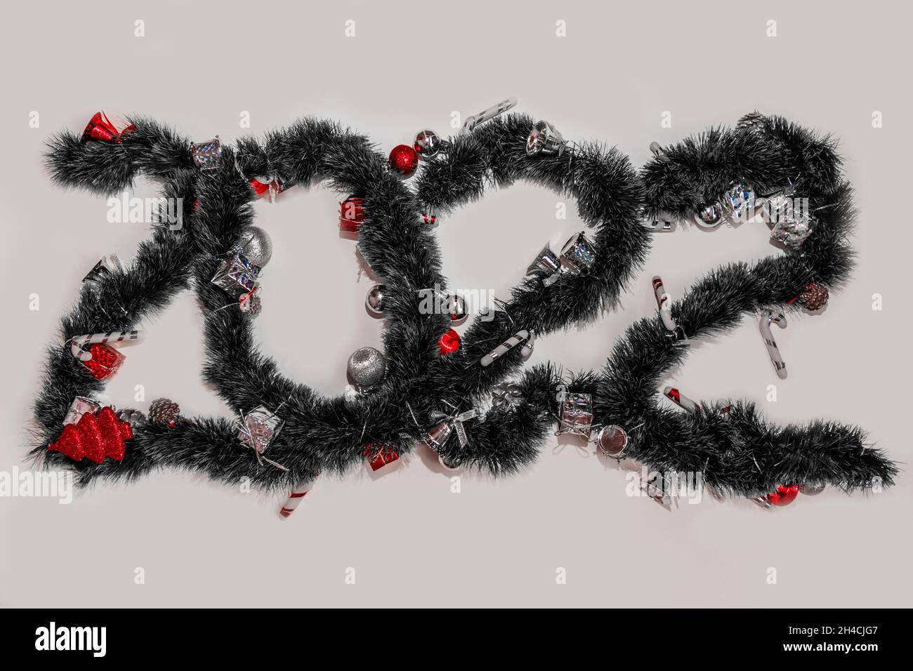 New Year, 2022. The number 2022 is laid out from a New Year's garland. Stock Photo