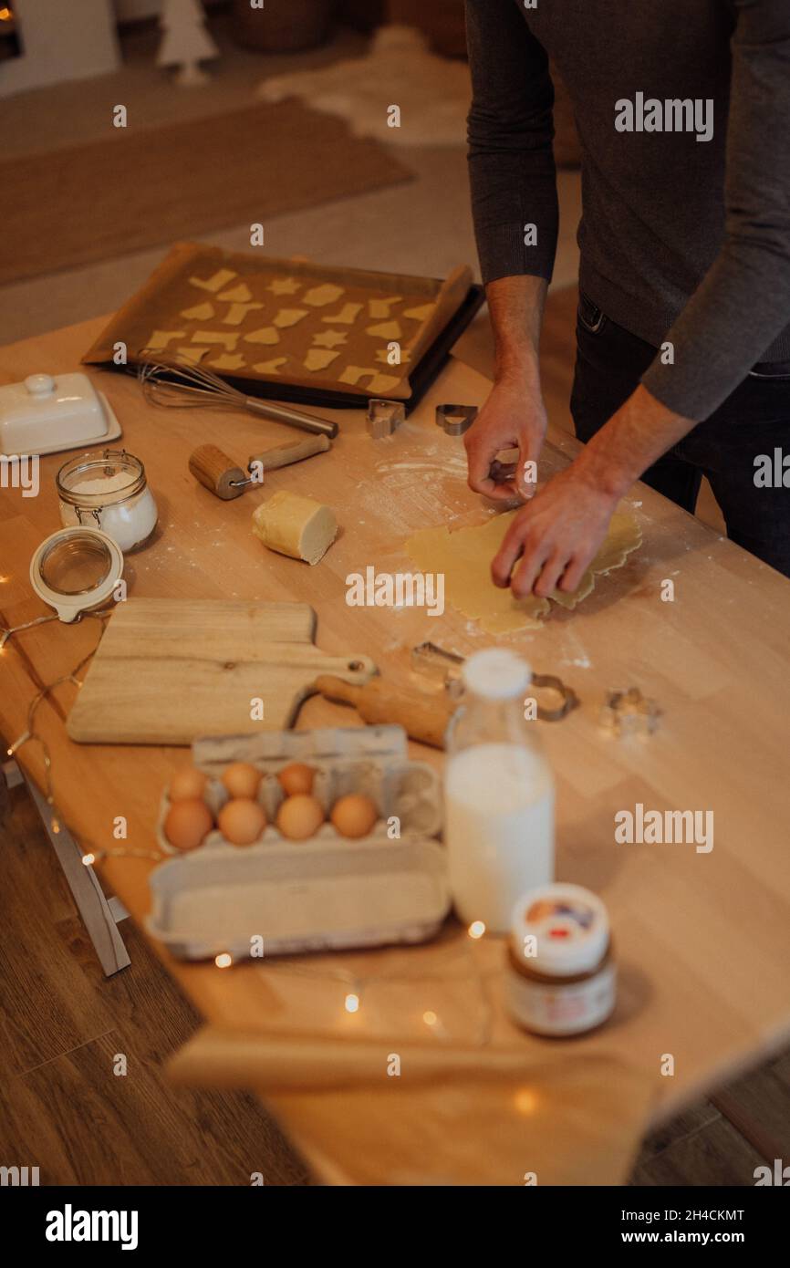Hand Make Food Pair of hands work in the kitchen with fresh ingredients to make cokies ...