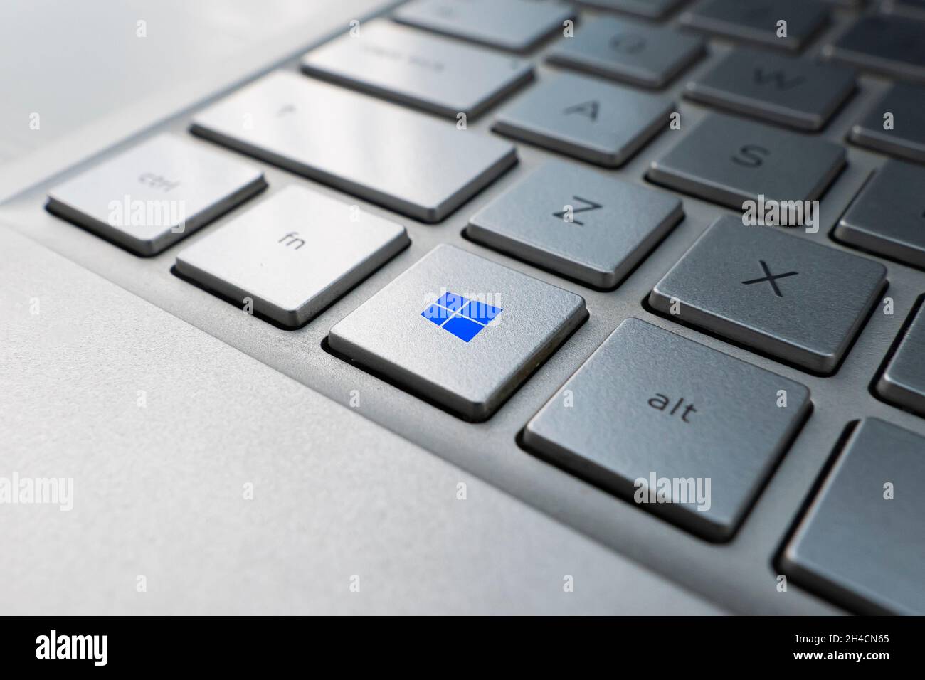 November 2. Barnaul, Russia. button with the logo Windows on the grey keyboard of a modern laptop. Stock Photo