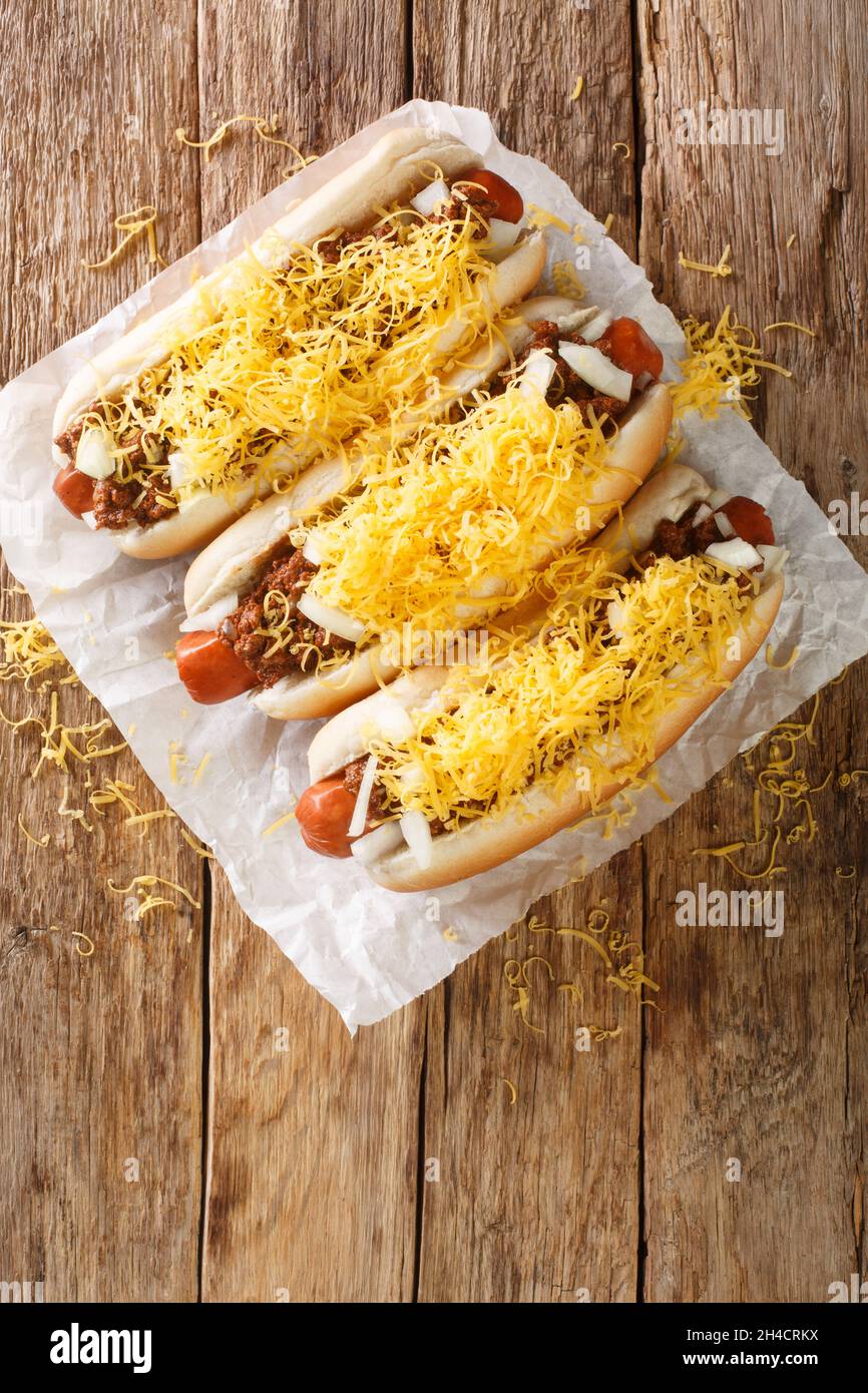 Cincinnati fast food chili hot dog with beef sausage, cheddar cheese