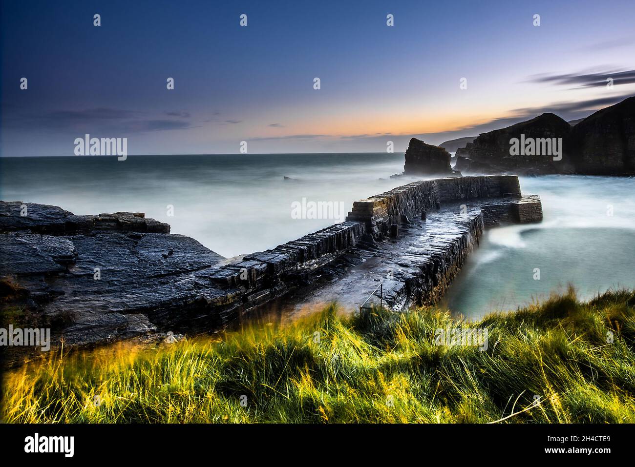 Latheronwheel Harbour on the NC500 route in Scotland. This hidden gem of a harbour is a secluded spot in Caithness in the Scottish Highlands Stock Photo