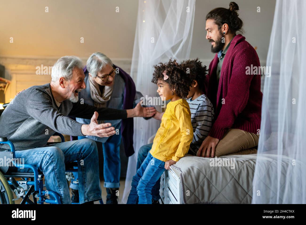 Portrait of multiethnic happy multigeneration family with adopted child. Love people concept Stock Photo