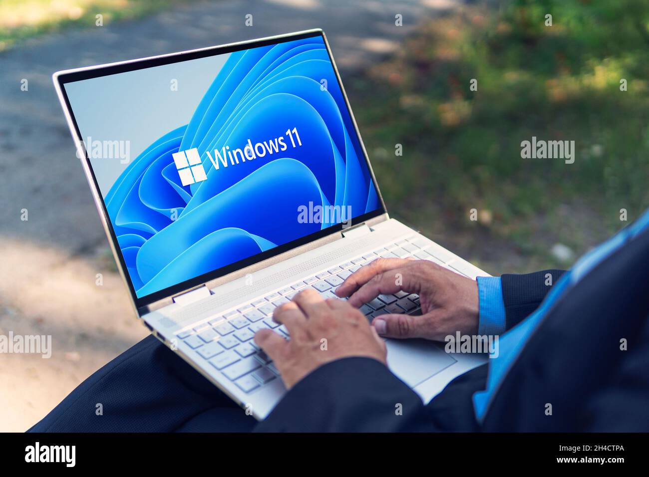 June 23, 2021. Barnaul, Russia. Windows 11 logo on the screens of a transformer laptop. A new operating system update from Microsoft Stock Photo