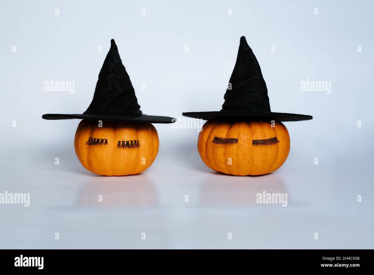Creative two small orange pumpkins with 
